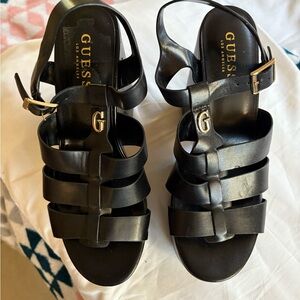 Guess Black Strappy Sandals with Gold Accents
new with out tag. Size 8.5.